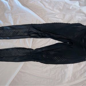 Spanx Leggings. Black coated material. Size M